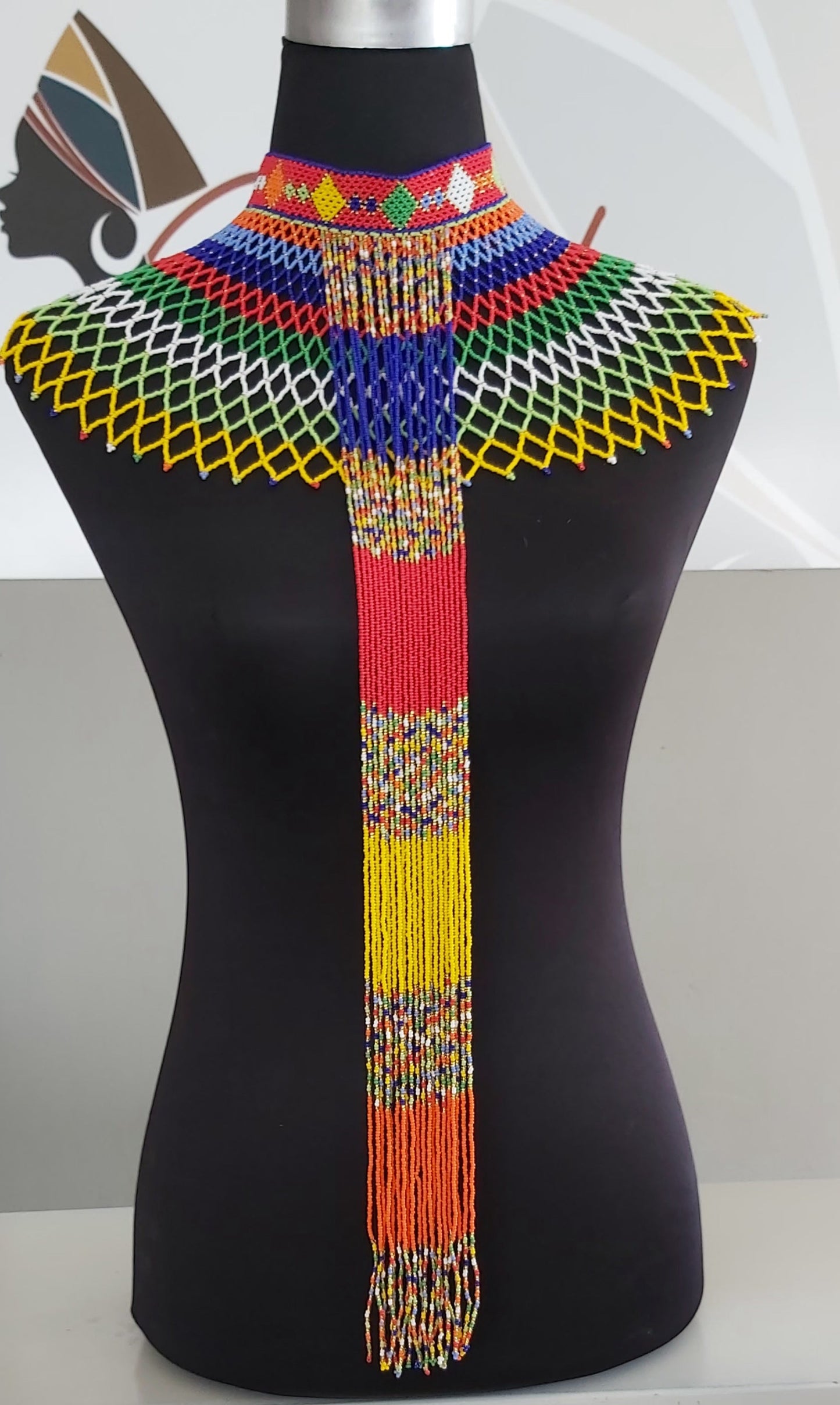 Webneckpiece with tassels